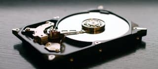 black internal hdd on black surface