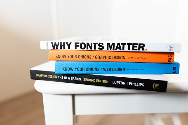 stack of books about graphic design.