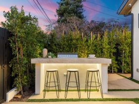 outdoor bar with chairs at sunset